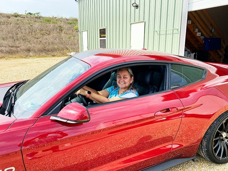 grand prize winner behind the wheel of the Mustang GT