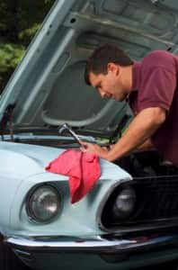 hood up fixing car