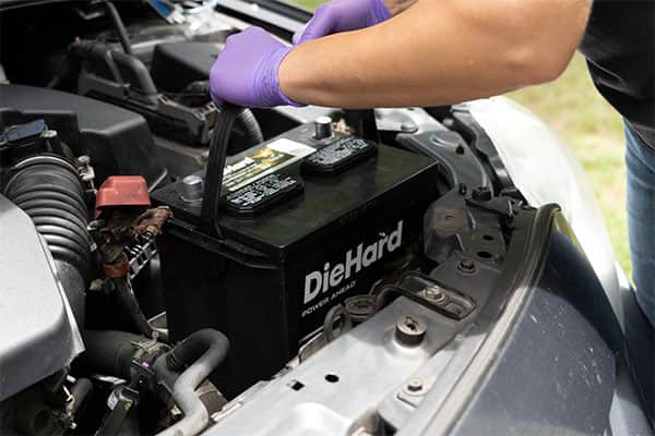 installing a DieHard battery in the driveway