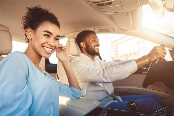 couple in car, getty